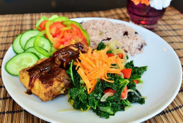 Spiced tofu with rice & peas, kale and fresh salad